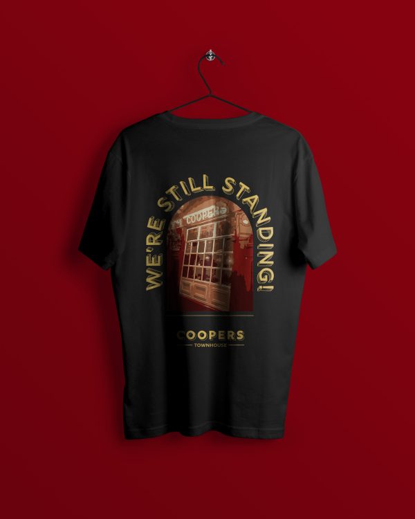 T-Shirt - Black Double Sided “100 Years, We’re Still Standing” - Image 2