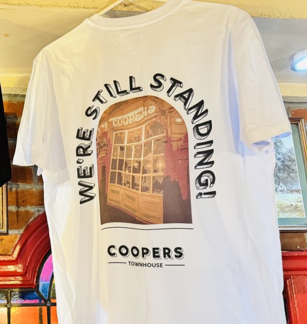 T-Shirt - White Double Sided “100 Years, We’re Still Standing” - Image 3